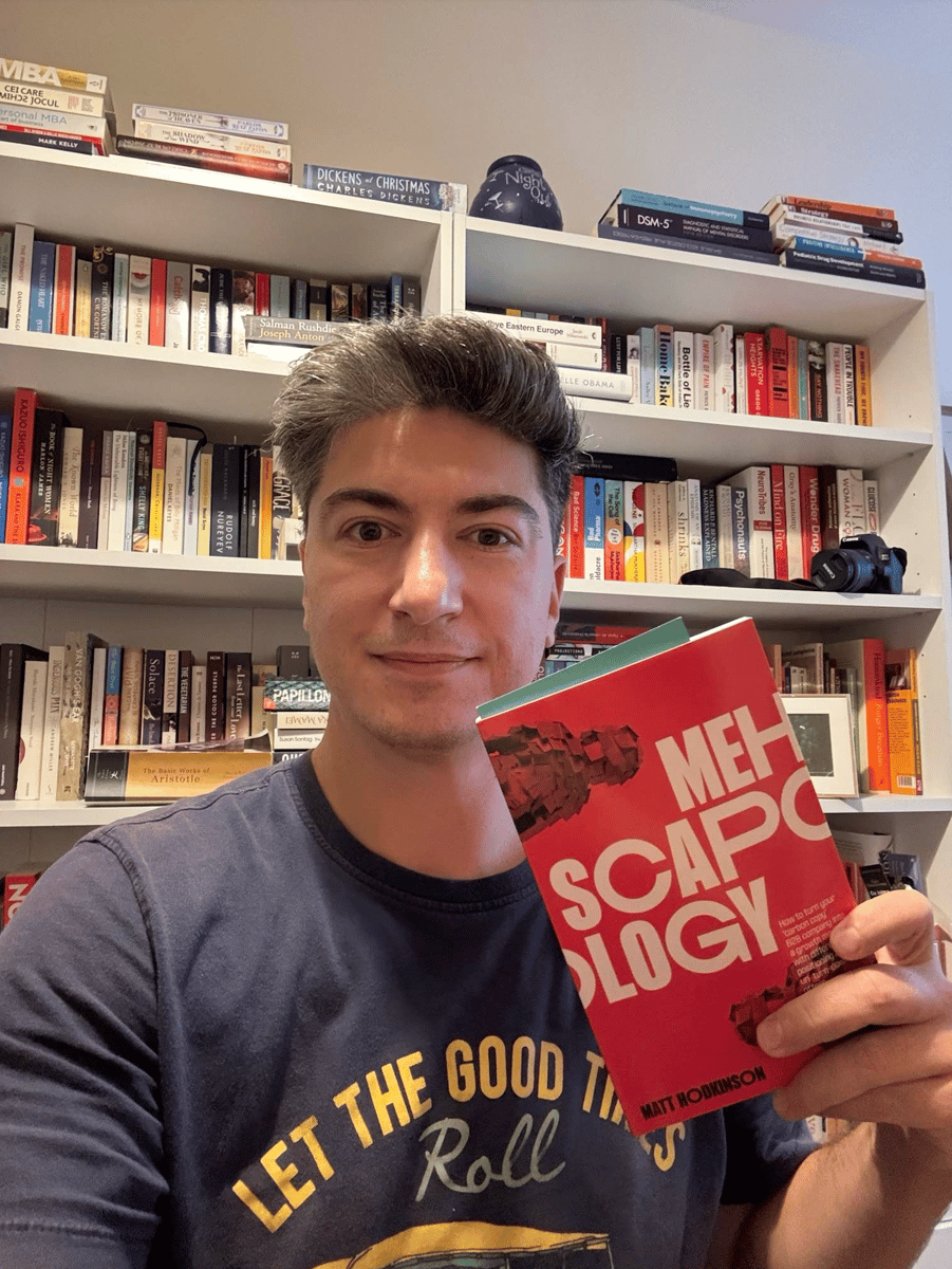 Happy customer receiving their MEHscapology book in the post